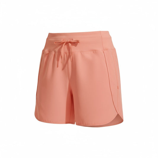 Peach-colored shorts with a tie waist on a white background