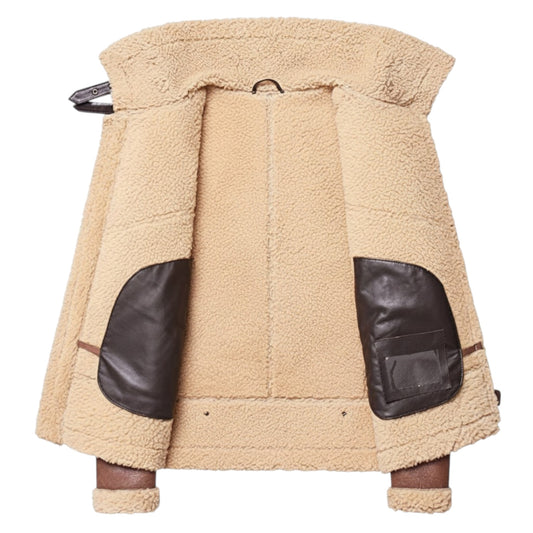Beige fleece jacket with black leather patches on a white background
