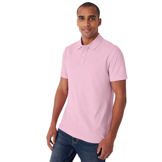 A man wearing a pink breathable polo shirt with a ribbed collar and short sleeves.