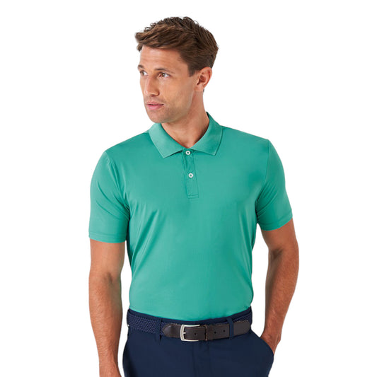 A man wearing a green Premium Smart Golf Polo with a Henley collar and short sleeves.
