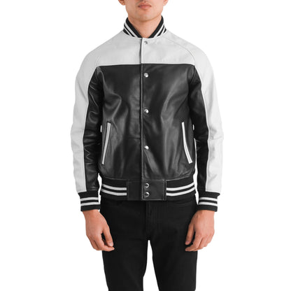 Black and white varsity jacket worn by a person on a white background