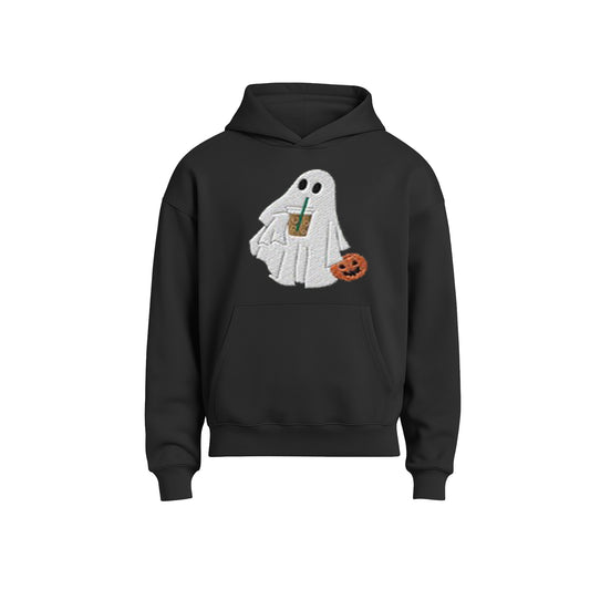 Black hoodie with a ghost design holding a pumpkin and drink on a white background