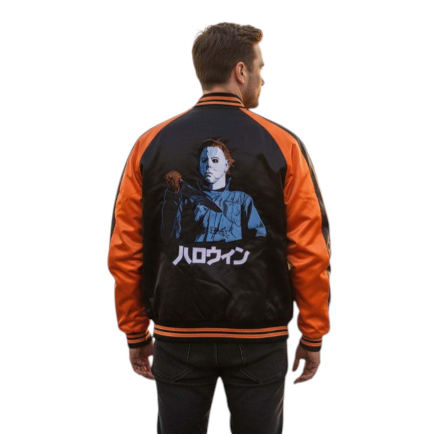 Person wearing a black and orange jacket with a graphic design on the back