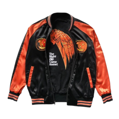 Black and orange varsity jacket with pumpkin design and text on a white background