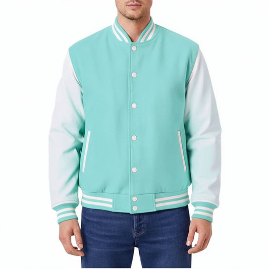 Turquoise and white varsity jacket worn by a person on a white background