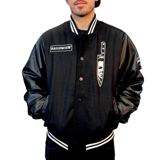 Black letterman jacket with 'Halloween' logo and knife design on a white background