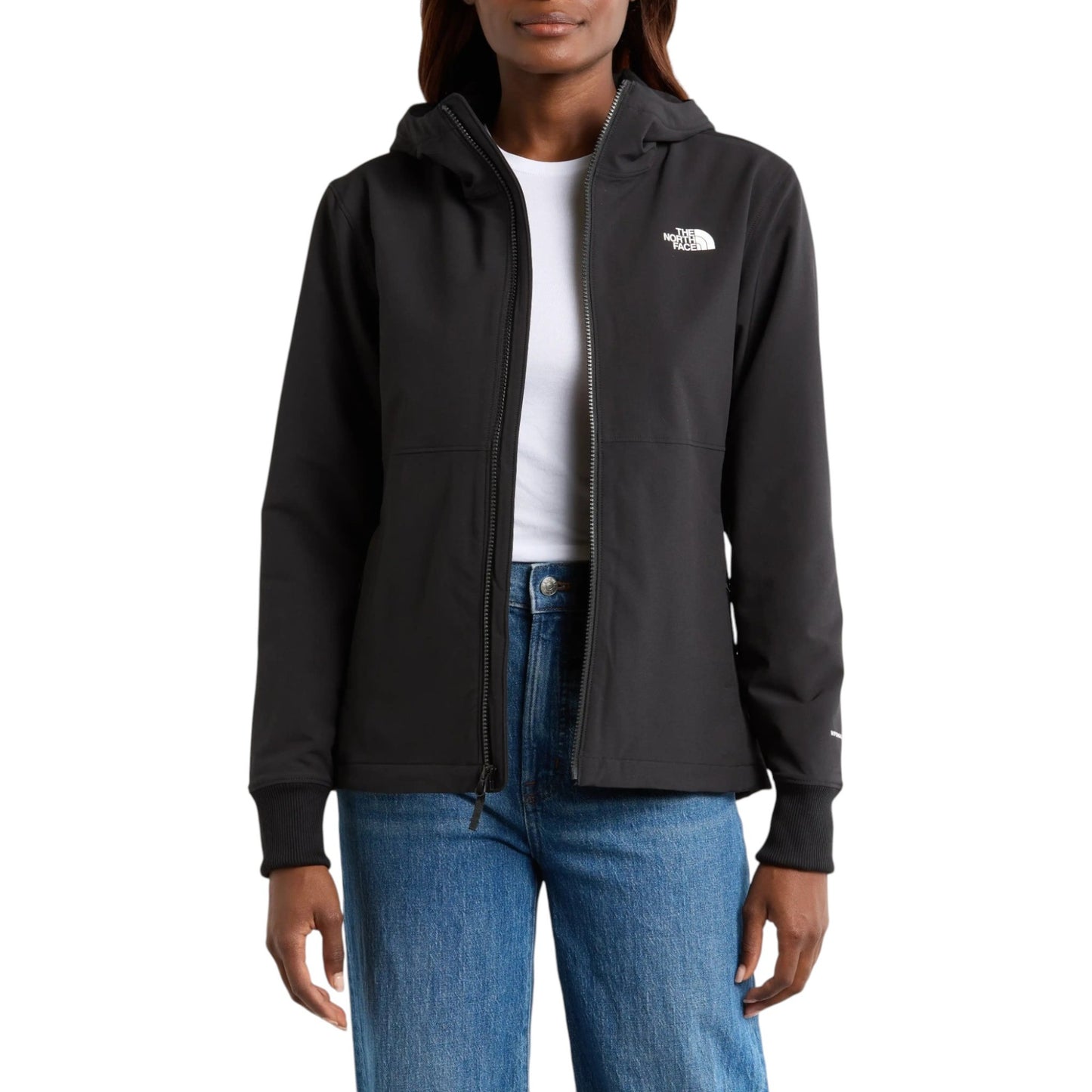 Person wearing a black jacket with a brand logo on a white background