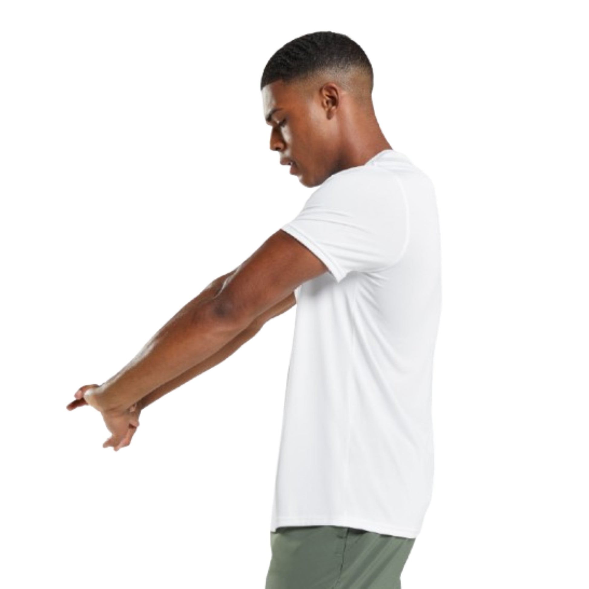 Man wearing a white t-shirt and green shorts on a white background