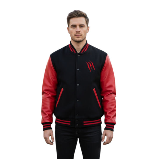 Man wearing a black and red varsity jacket on a white background