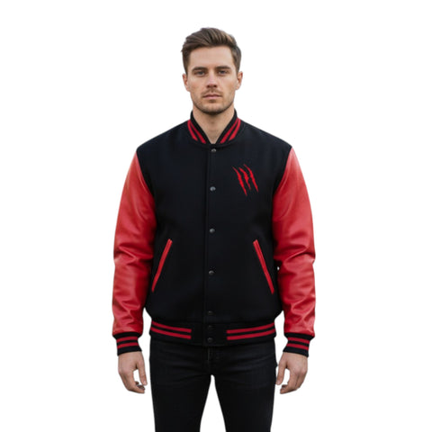 Man wearing a black and red varsity jacket on a white background