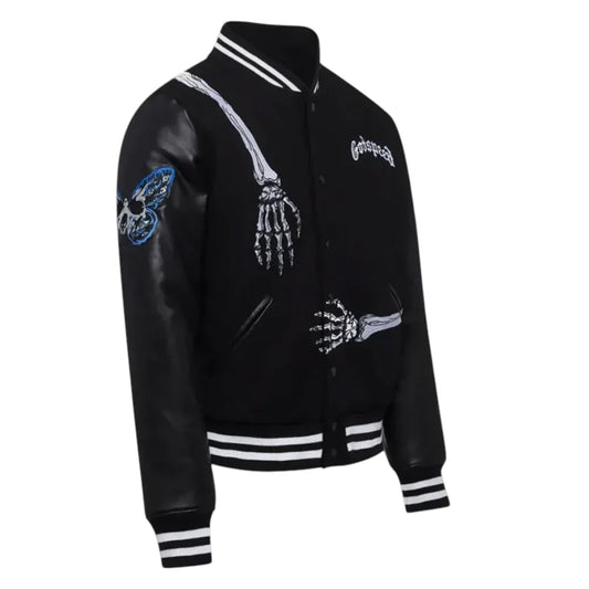 Black varsity jacket with skeleton designs on a white background