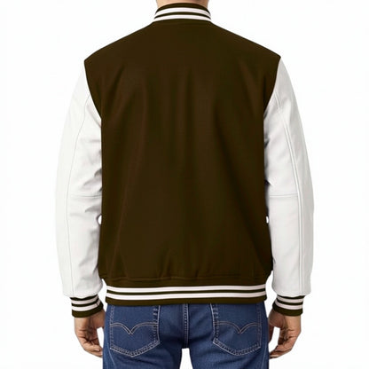 Brown and white varsity jacket with blue jeans on a white background