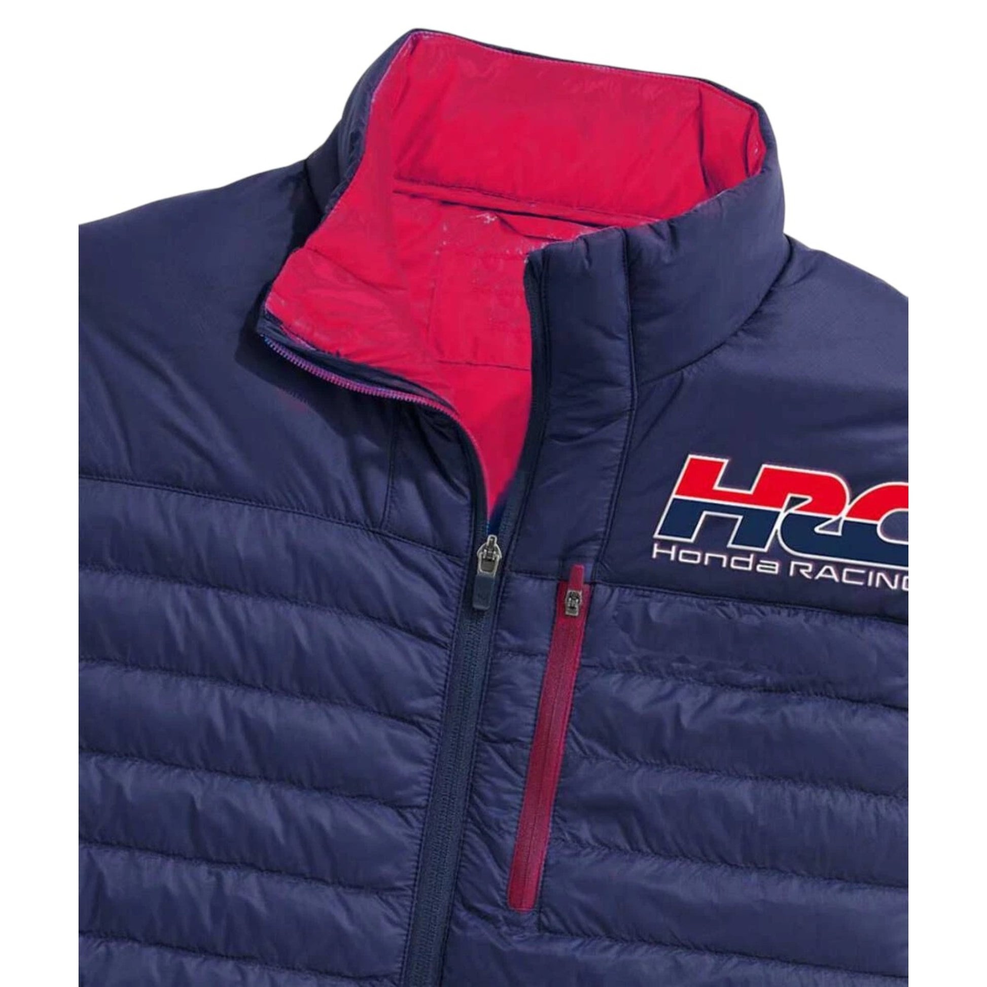 Navy blue puffer vest with red interior and Honda Racing logo on a white background