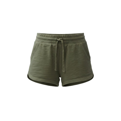 Green shorts with a drawstring on a white background