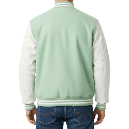 Light green varsity jacket with white sleeves worn by a person on a white background