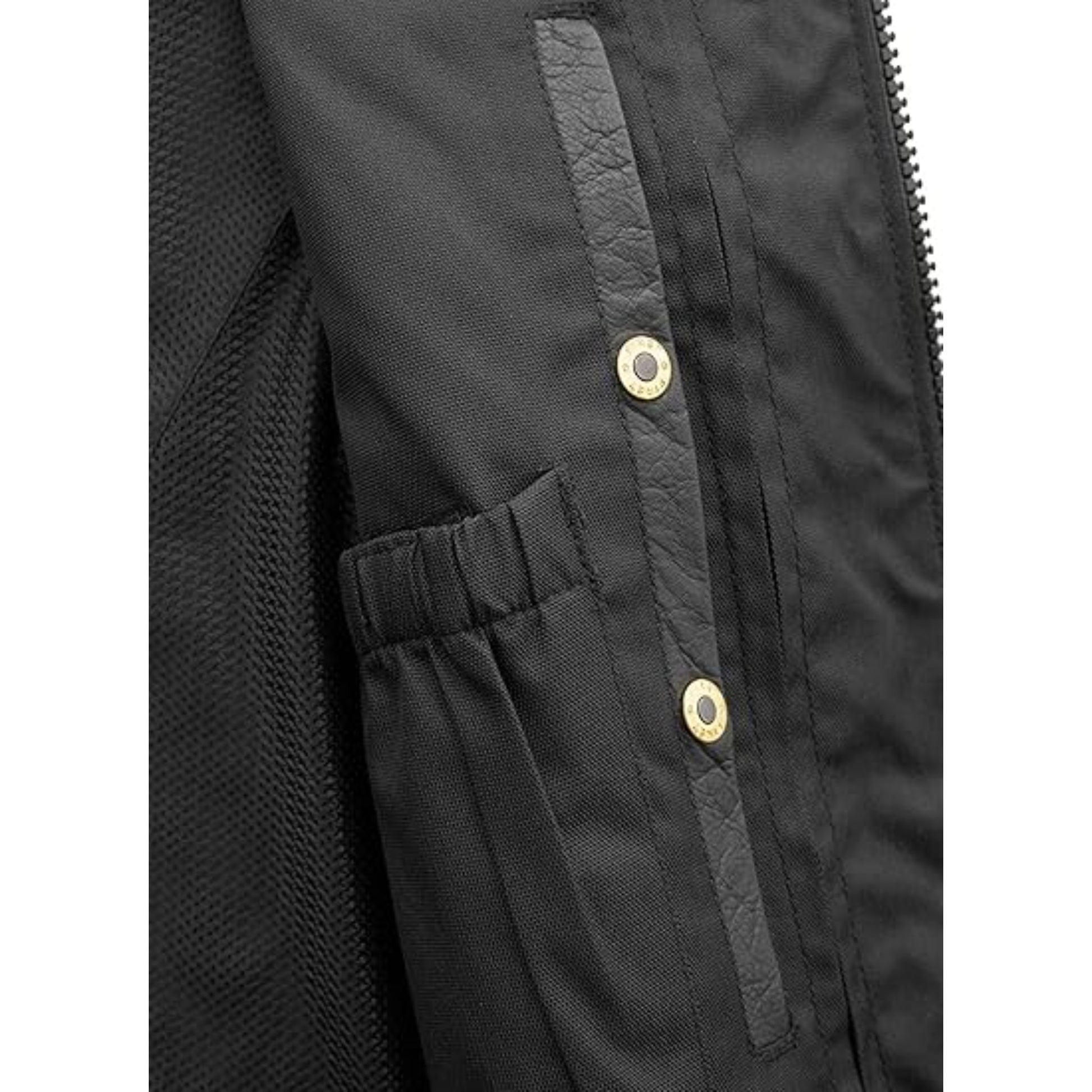 Close-up of a black jacket with gold buttons on a white background