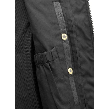 Close-up of a black jacket with gold buttons on a white background