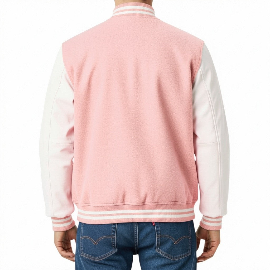 Person wearing a pink and white varsity jacket on a white background