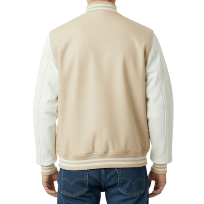 Beige and white varsity jacket worn by a person on a white background
