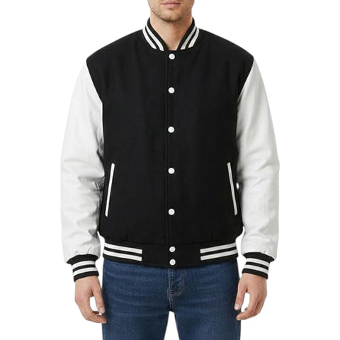 Black and white varsity jacket worn by a person on a white background