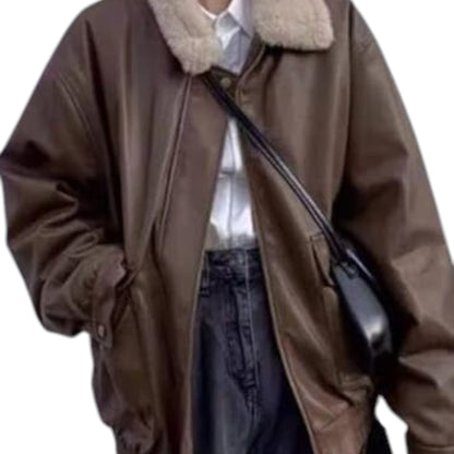 Brown coat with fur collar and a black object held in hand on a white background