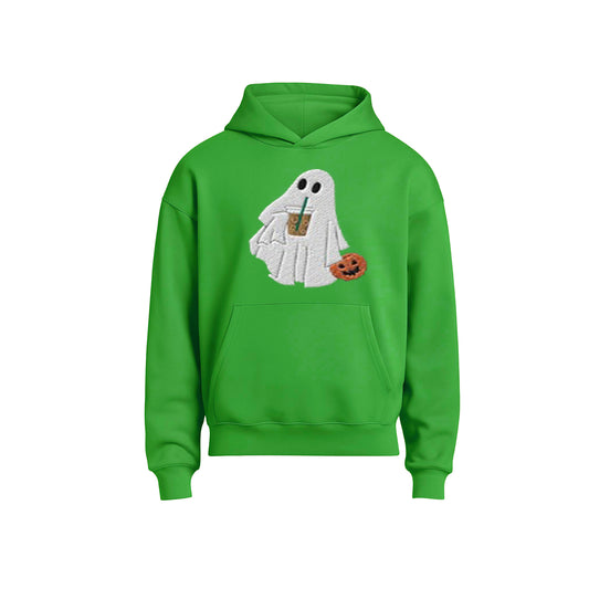 Green hoodie with a ghost design holding a coffee cup and pumpkin on a white background