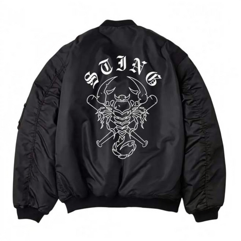A black bomber jacket shown from the back, featuring a large white graphic print of a scorpion with crossed bones and the word 'STING' in a gothic font above it.