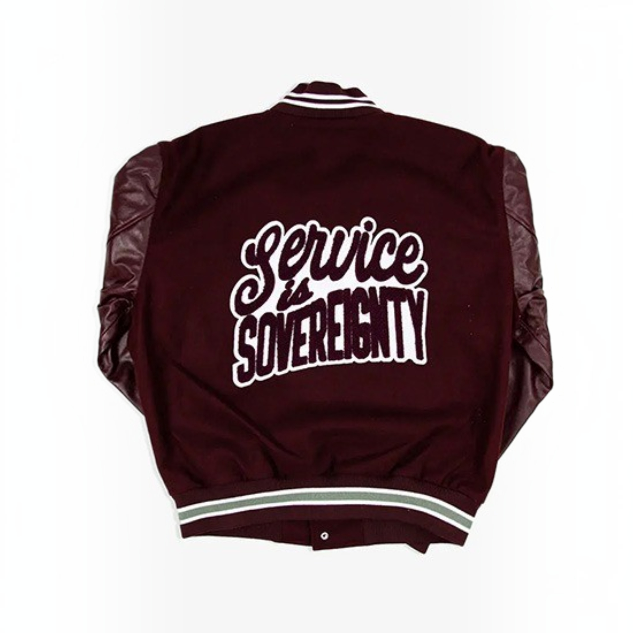 A maroon varsity-style jacket shown from the back, featuring dark brown leather-look sleeves and a large white embroidered graphic reading 'Service is SOVEREIGNTY' across the back. The jacket has white and light green striped ribbing at the collar, cuffs, and hem.