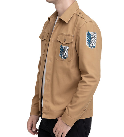 A tan military-style field jacket with the Attack on Titan Scout Regiment patch on the chest and upper sleeve, worn by a model against a white background.