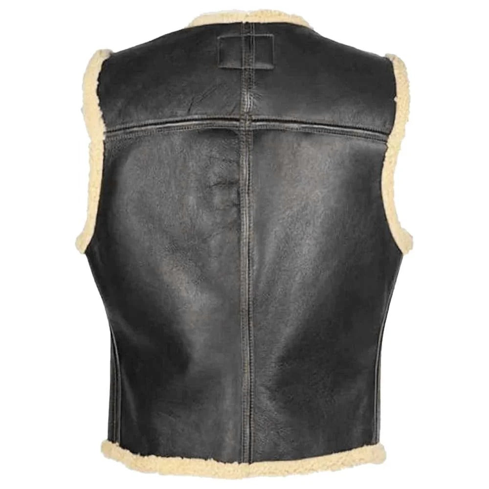 Black leather vest with cream shearling lining, shown from the back on a white background.