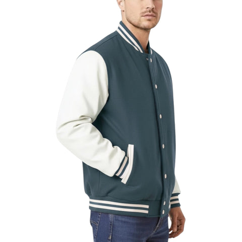 Man wearing a Charcoal and white varsity jacket on a white background
