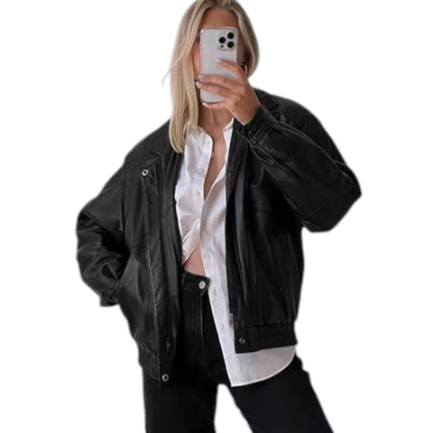 Person wearing a black jacket over a white shirt on a white background