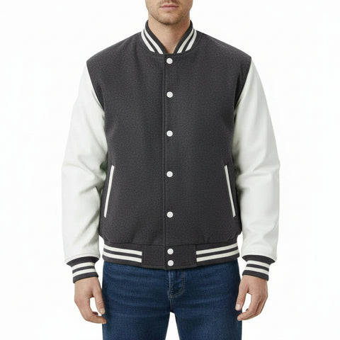 Person wearing a Dark Gray and white varsity jacket on a white background