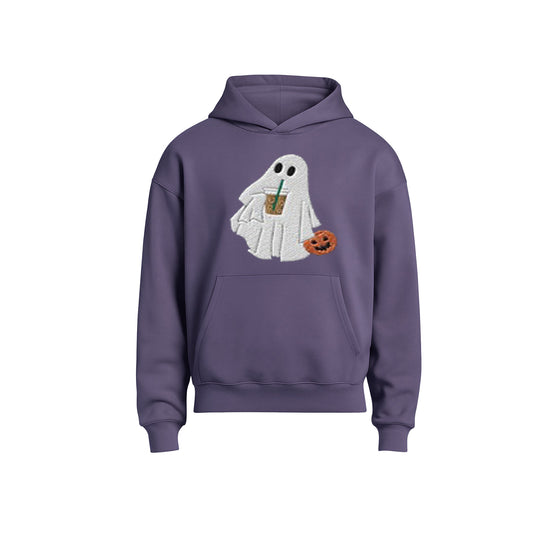 Purple hoodie with a ghost design holding a coffee cup and pumpkin on a white background