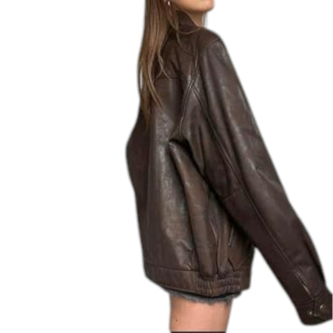 Brown leather jacket worn by a person on a white background