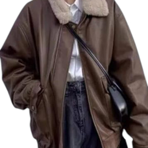 Brown coat with fur collar and a black object held in hand on a white background