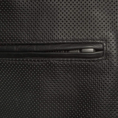 Close-up of a black textured bag with a zipper