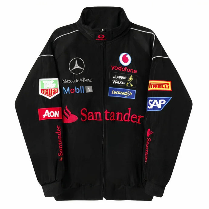 Black jacket with various brand logos on a white background