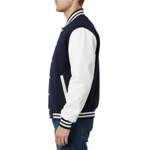 Person wearing a navy and white varsity jacket on a white background