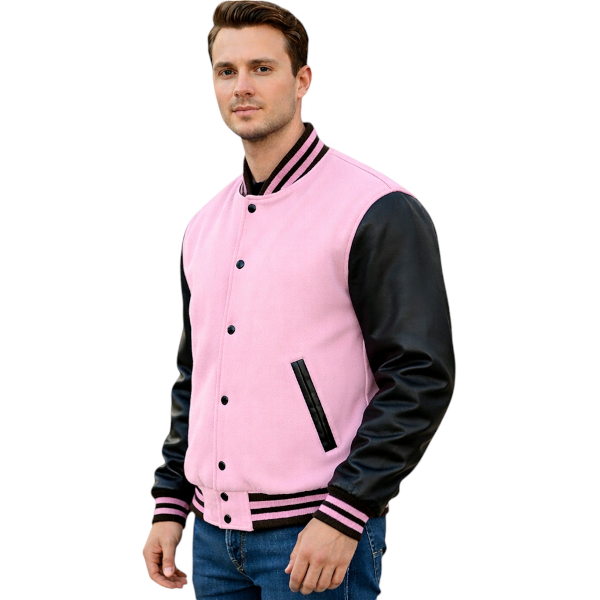 A man wearing a pink and black varsity jacket with black leather-look sleeves, black buttons, and pink and black striped ribbed collar, cuffs, and hem, paired with blue jeans against a plain white background.