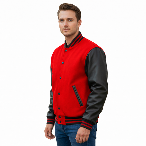 A man wearing a red and black varsity jacket with black leather-look sleeves, standing against a plain white background.