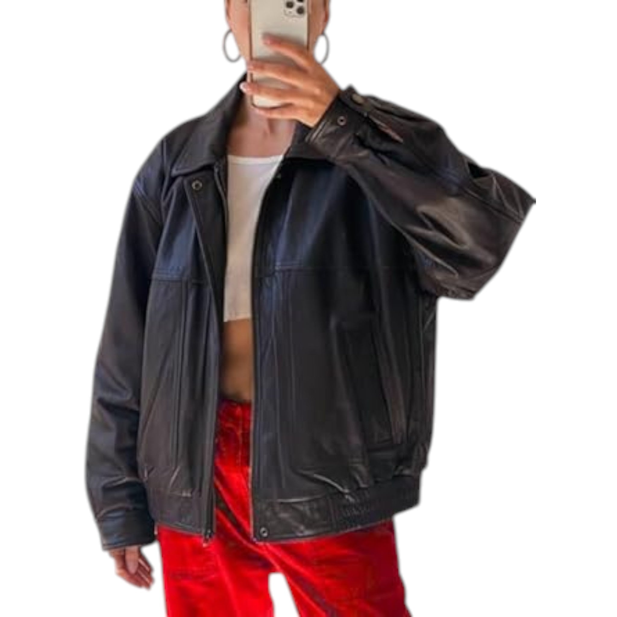Person wearing a black leather jacket over a white shirt and red pants on a white background