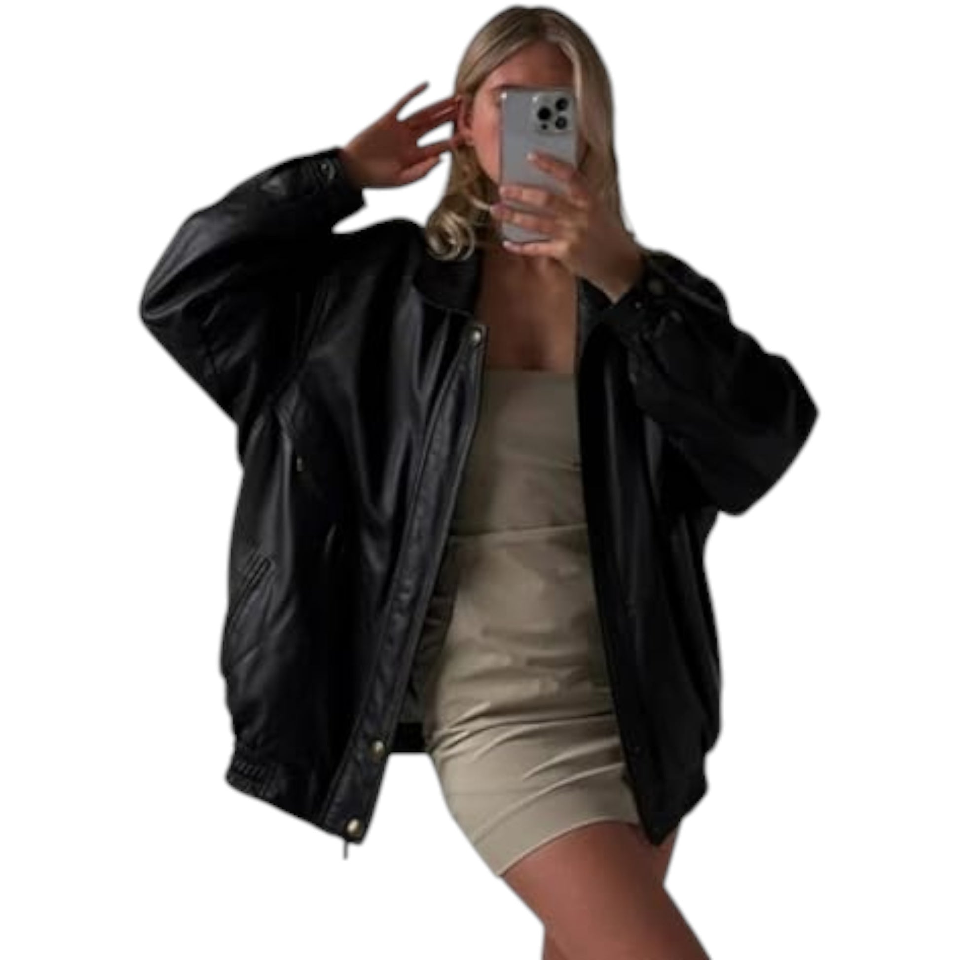 Person wearing a black jacket and beige dress, taking a selfie on a white background