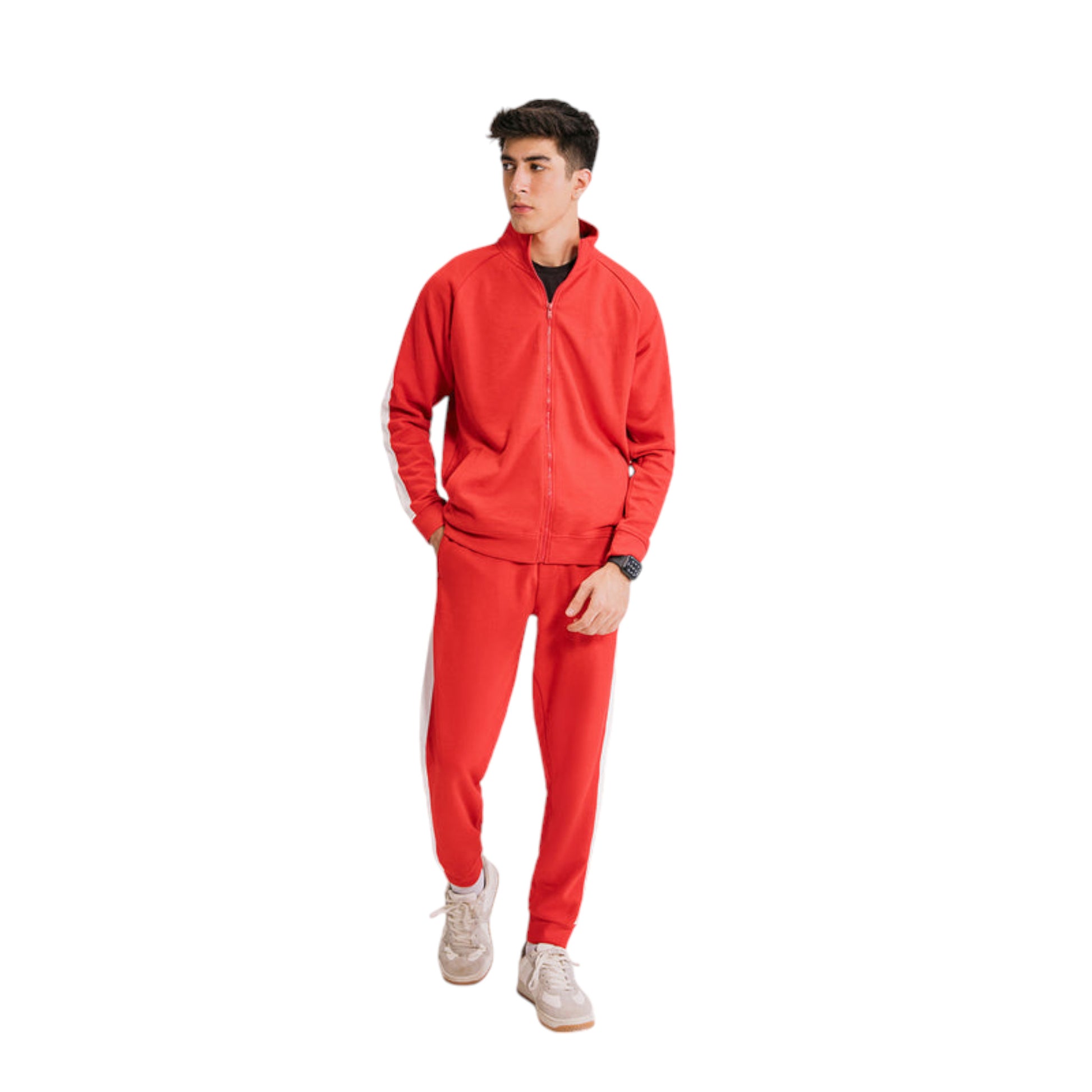 A man wearing a full-zip red jacket with white stripes on sleeves and shoulders, paired with matching red pants.