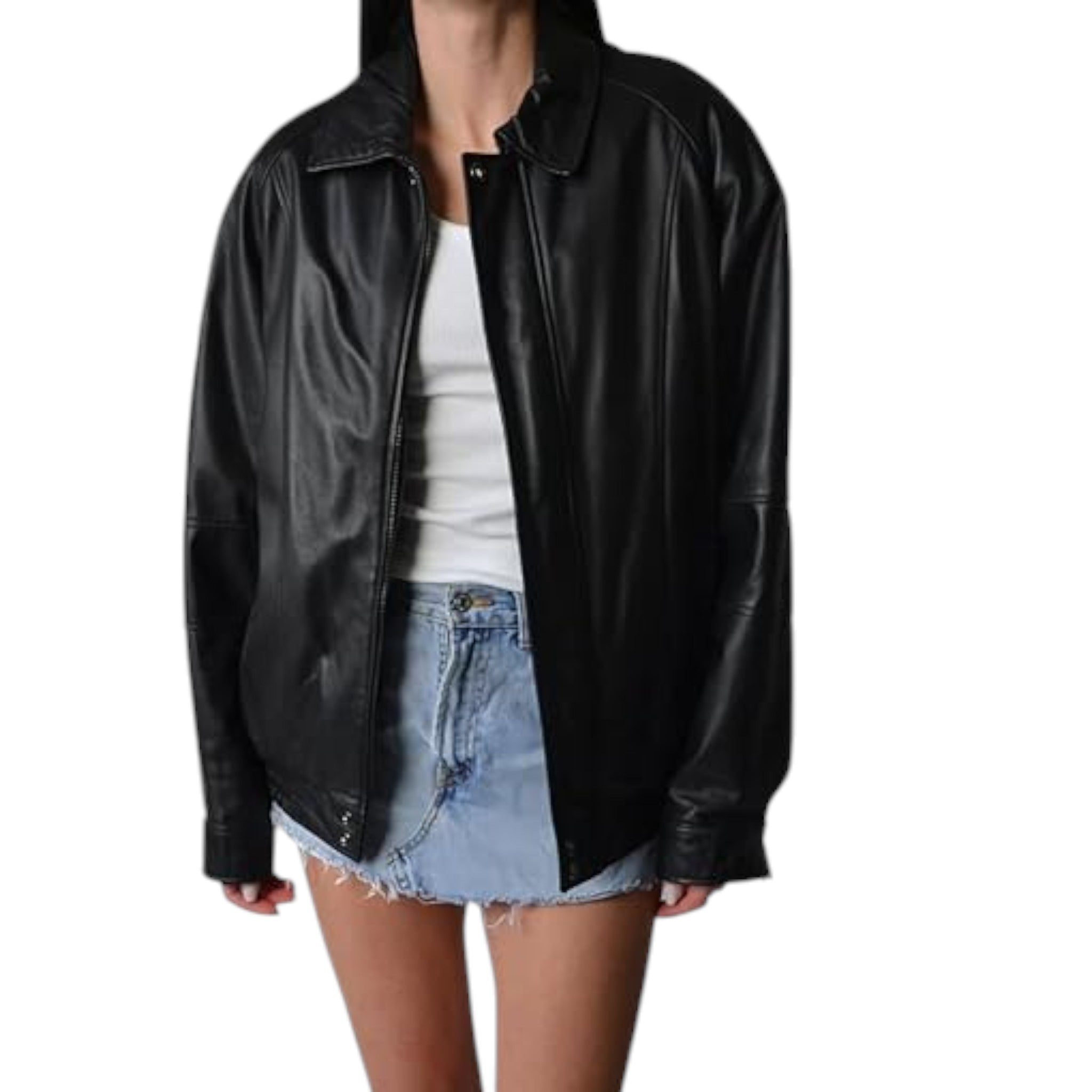 Person wearing a black leather jacket over a white shirt and denim shorts on a white background