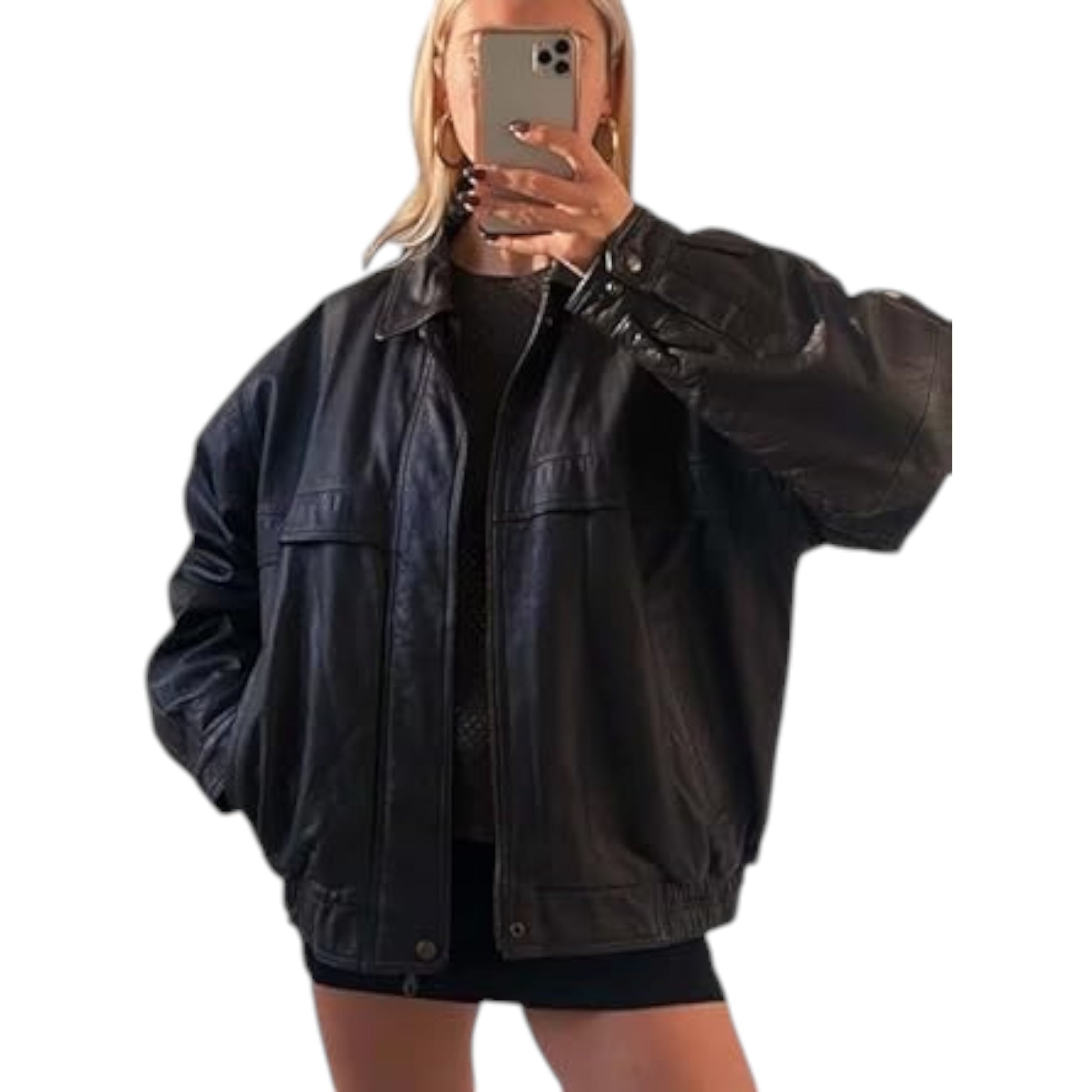 Person wearing a black leather jacket taking a mirror selfie on a white background