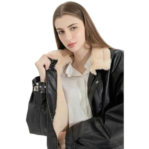 Woman wearing a black leather jacket with fur lining on a white background