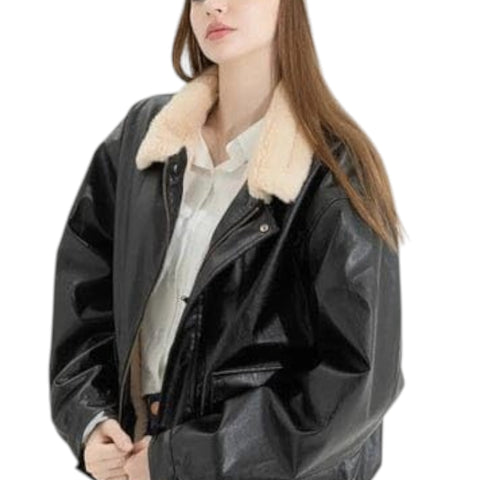 Person wearing a black jacket with fur lining on a white background