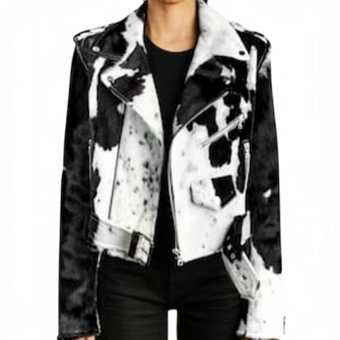 A woman modeling a cropped, long-sleeve leopard-print jacket over a white ribbed top and light-wash blue jeans, set against a plain white background.