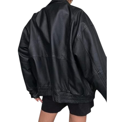 Black leather jacket worn by a person on a white background